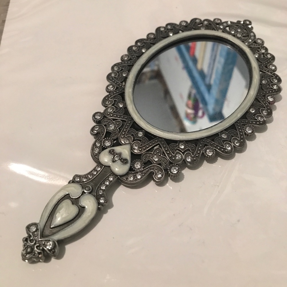 Beautiful hand mirror approximately 10"