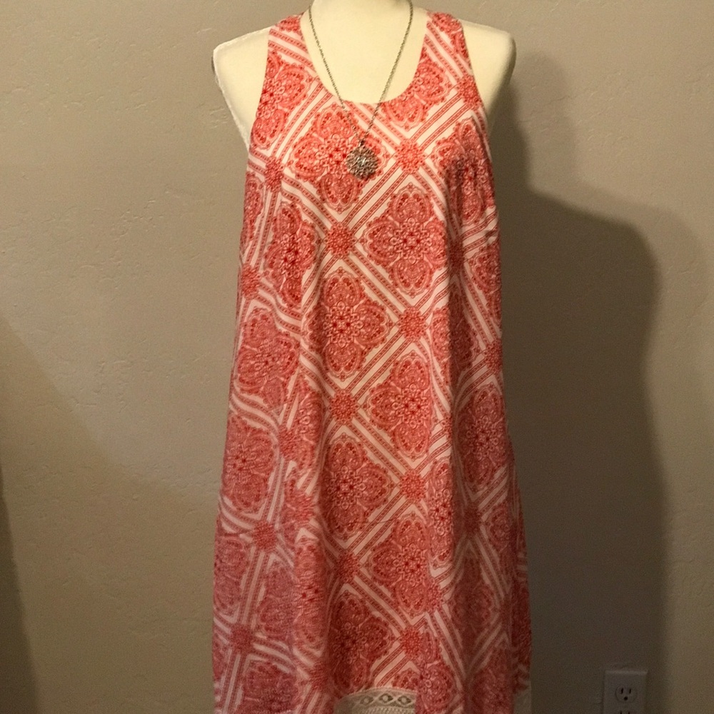 New red and white dress with lace detailing.
