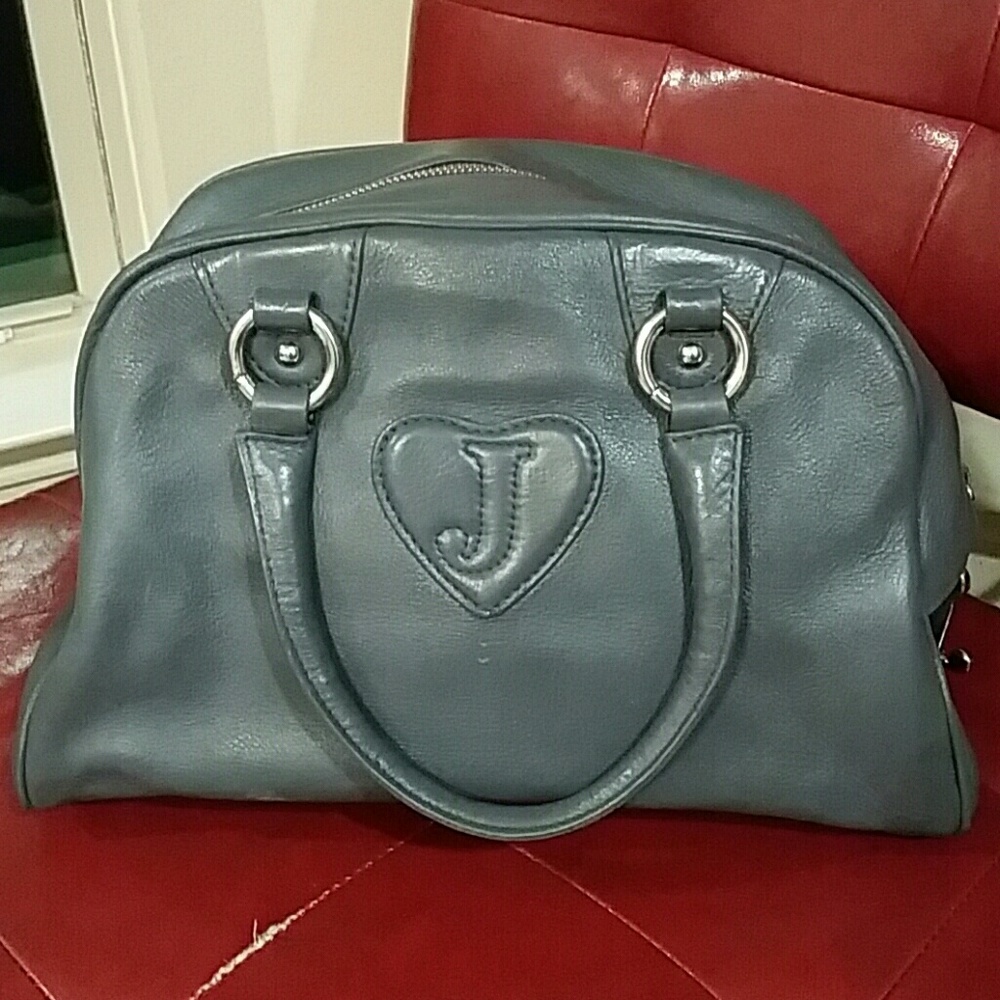 Cute gray leather Juicy Couture purse.