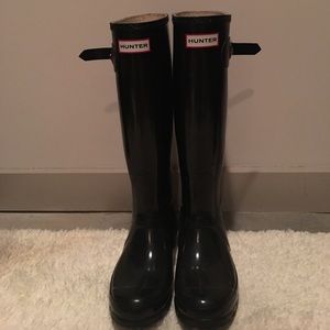 Tall black hunter rain boots