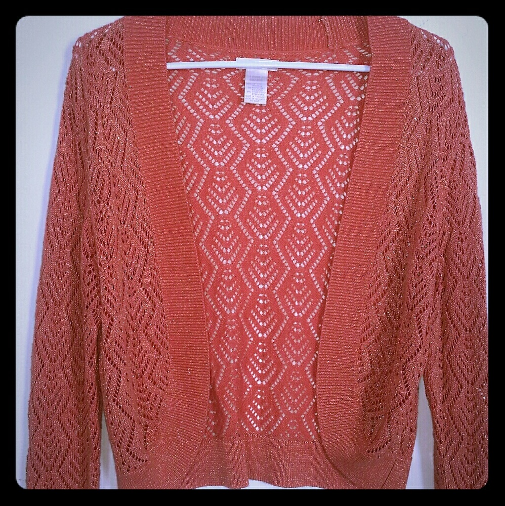 Orange crochet cardigan with gold sparkle