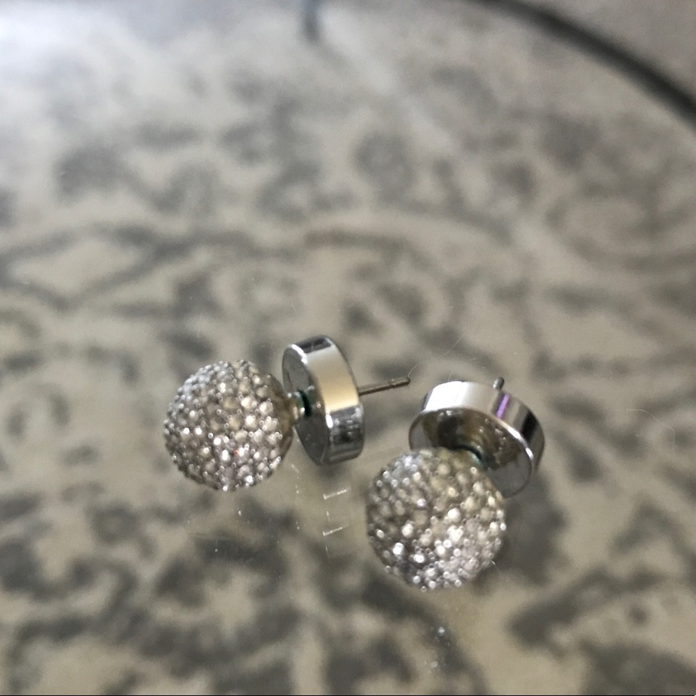 Michael Kors silver ball earrings.