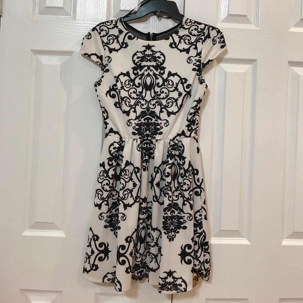 Junior black and ivory dress