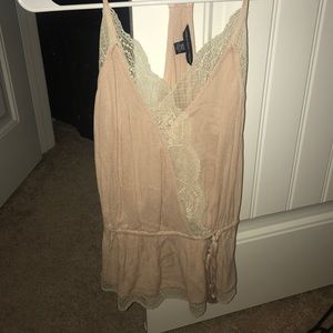 It's a really light pink shirt with some lace!