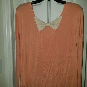 Flowy long sleeve with bow tie back