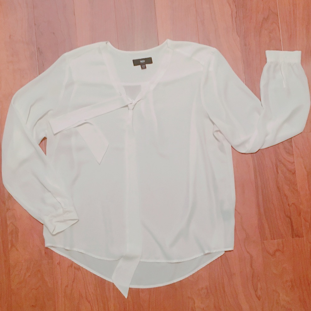 White blouse with long tie in the front