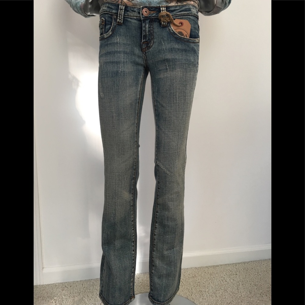 NWT Distressed Low Rise Jeans in a Vintage Faded Wash