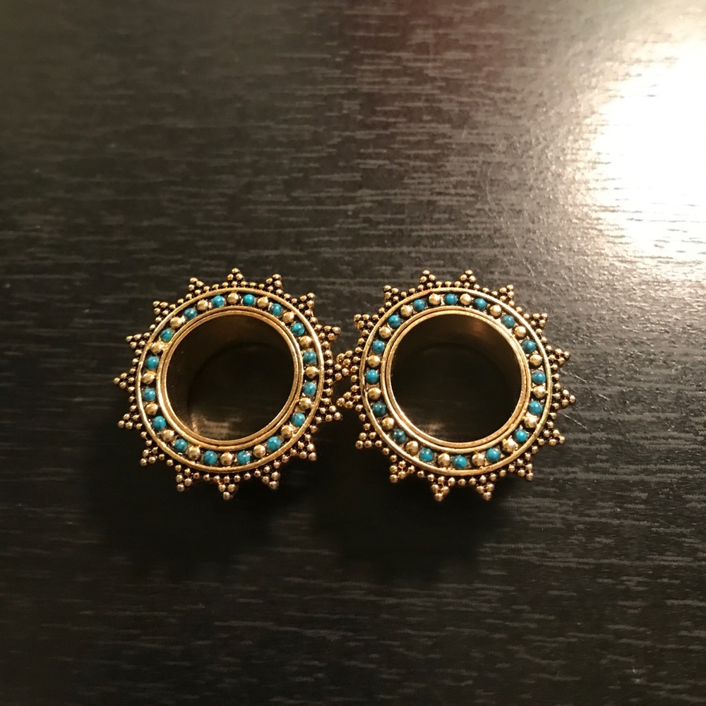 Golden Egyptian plugs