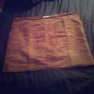 Brown suede skirt.
