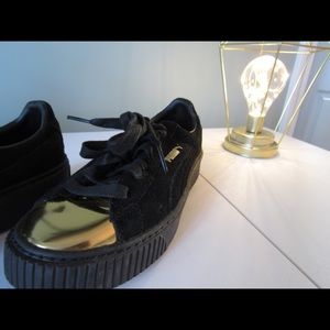 Puma black and gold suede platform sneakers Puma black and gold suede platform sneakers