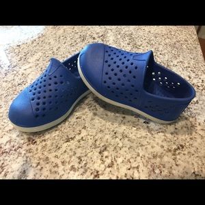 Toddler size 6 toms made out of croc material