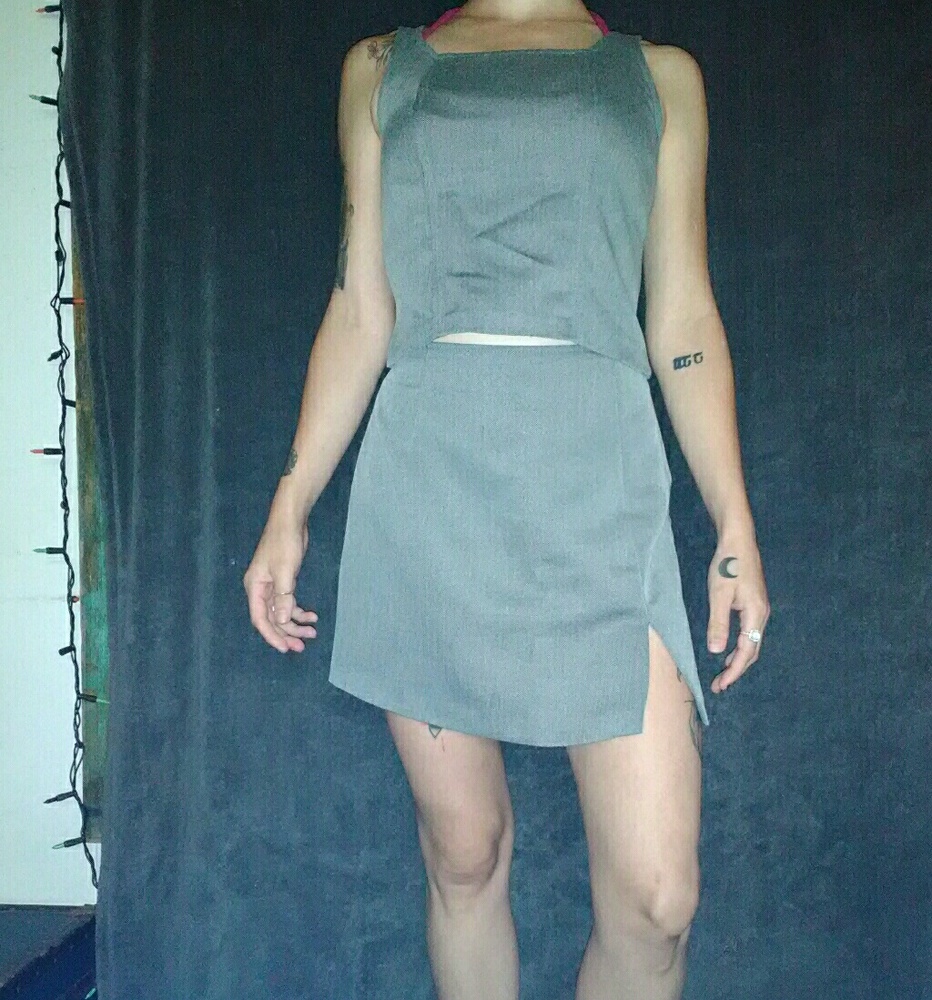 Two piece crop top/skirt suit