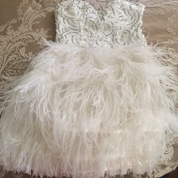 bebe Dresses & Skirts - Bebe white feather dress!