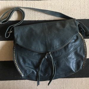 The Sak roomy blue leather messenger bag