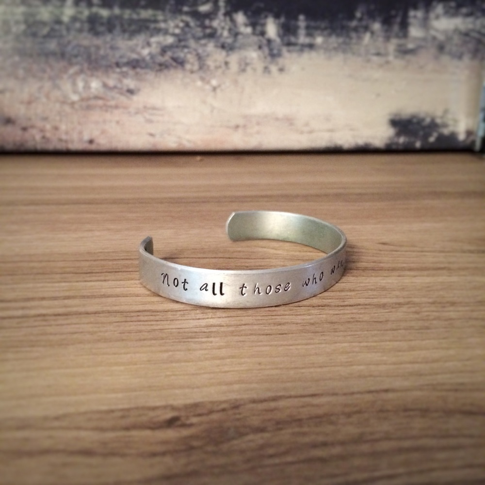 Hand Stamped bracelet with bird stamp and compass