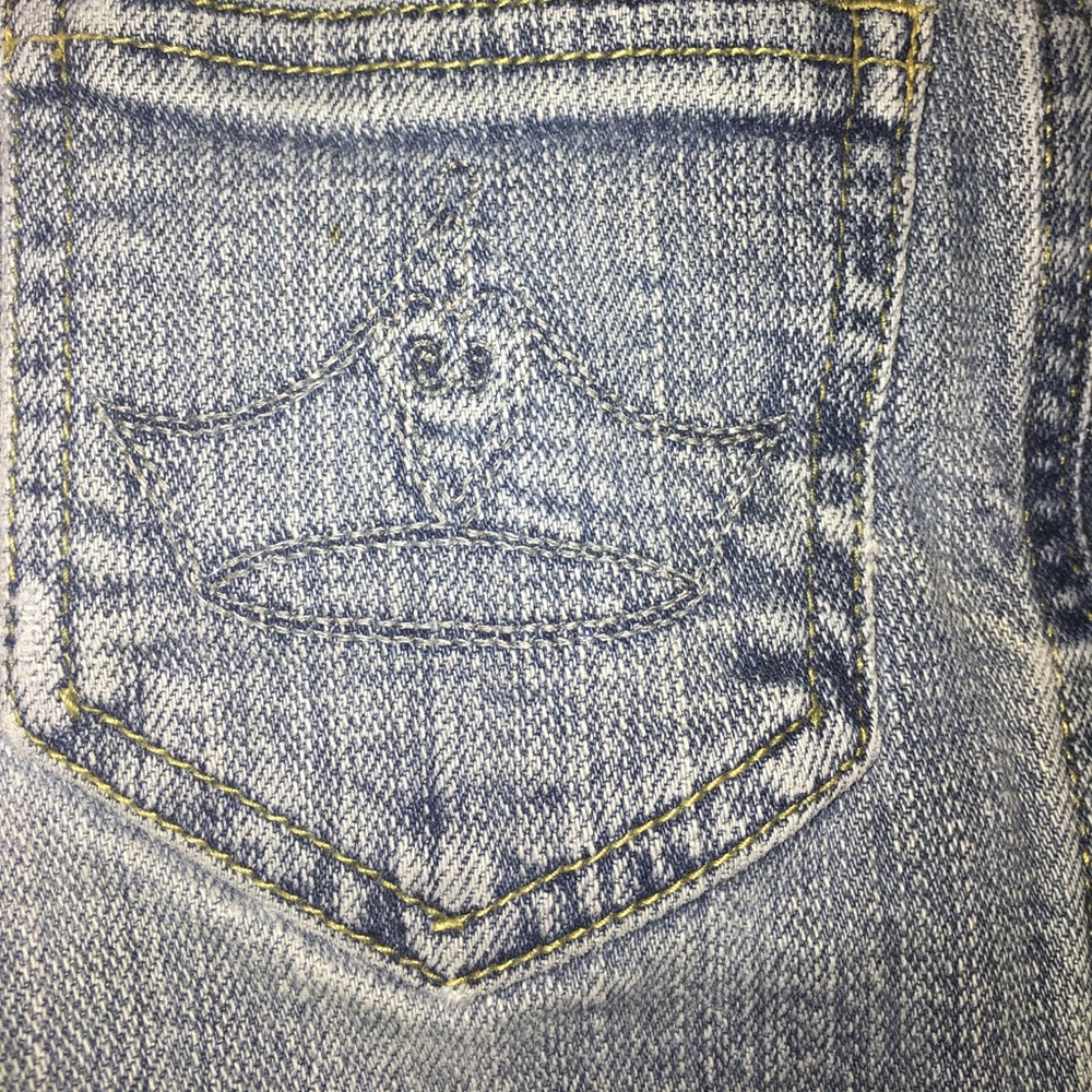 DISNEY STORE Crown Kids jeans.