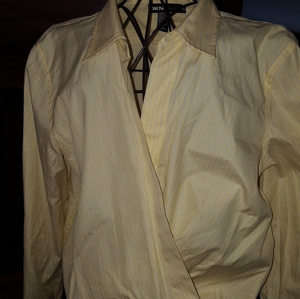 Snap bottom stay put blouse