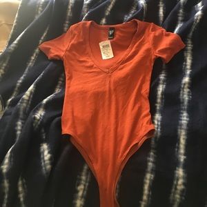 burnt orange bodysuit