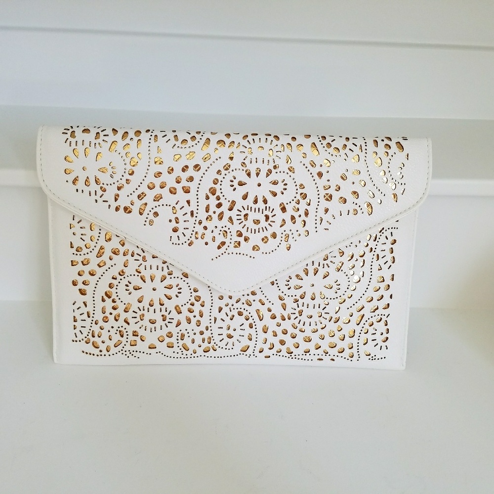 White envelope clutch with gold accents
