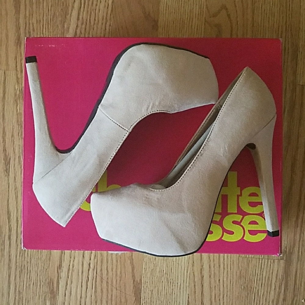 New in box nude pumps