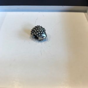 Discontinued hedgehog pandora charm.