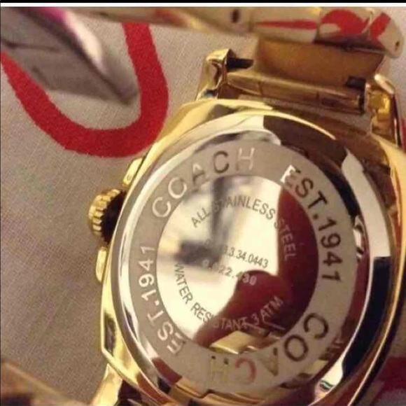 Gold coach watch