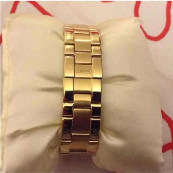 Gold coach watch