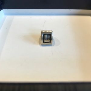 Discontinued “L” pandora charm