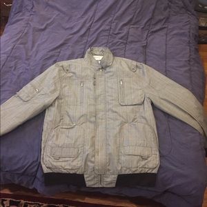 A gray Five Four lightweight zip up jacket