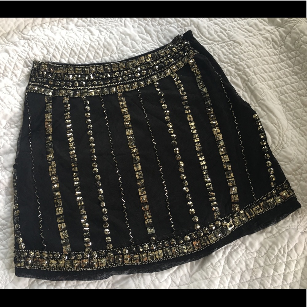 Angie short black skirt w/ metallic embellishments