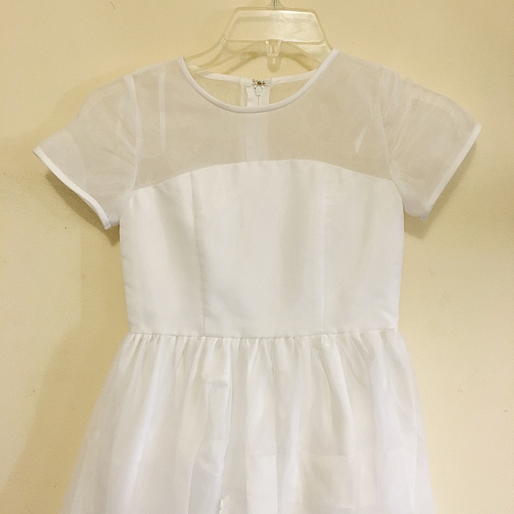 White Dress with Bow on back and Beautiful Flowers