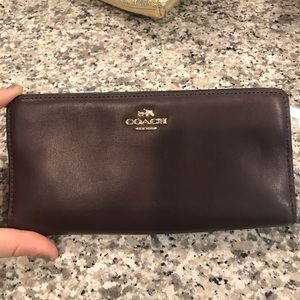 Coach dark plum leather wallet