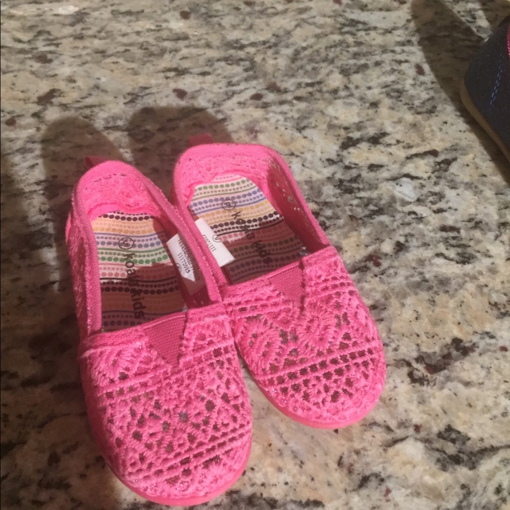 Pink lace slip-ons
