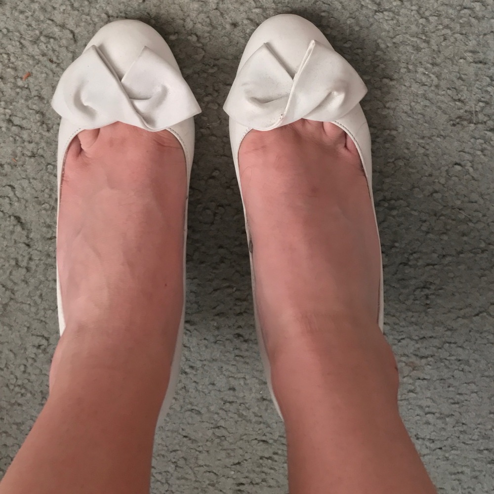 White bowed heels