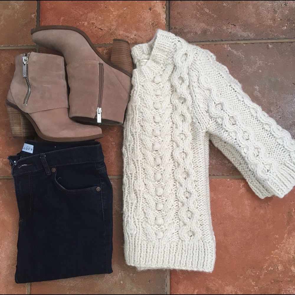 Cream colored three-quarter sleeve wool sweater