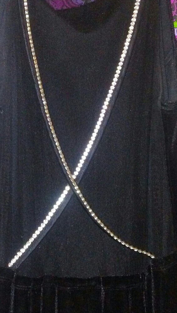 Formal black velvet gown with sheer back.