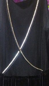 Formal black velvet gown with sheer back.