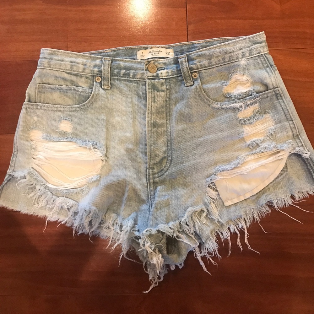 High waisted, distressed light jean shorts