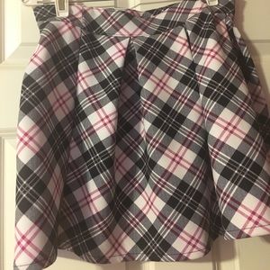 A Pink And Black Plaid Skater Skirt