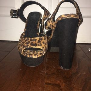 Cheetah an black platform pumps