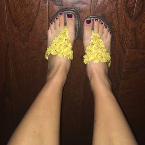 Yellow flower flip flops