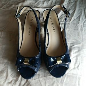 Peep toe bow slingbacks