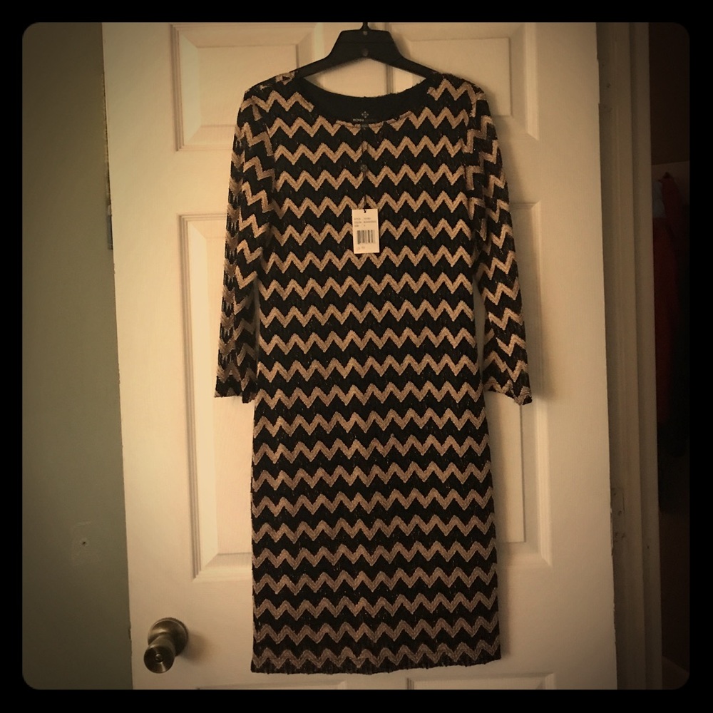 Fitted black and metallic gold dress