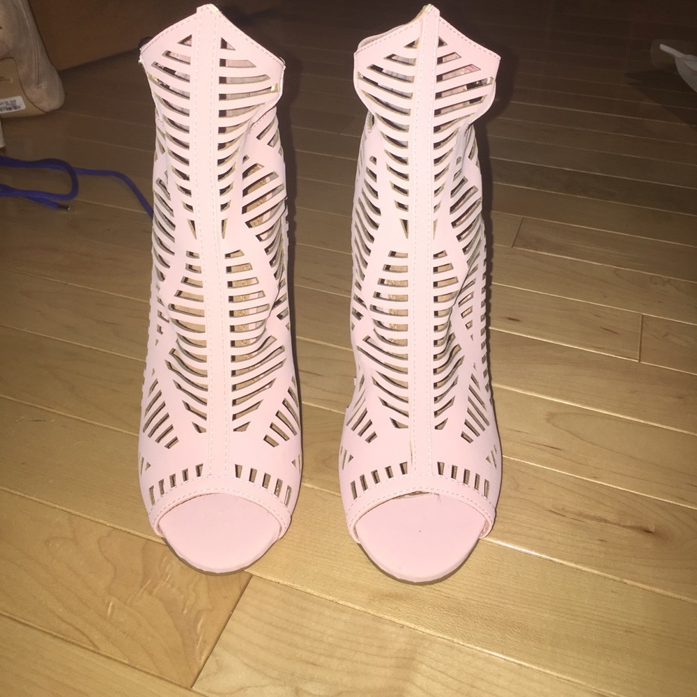 Pink caged ankle strap heel. Never been worn