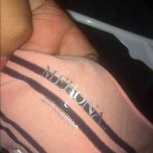 Peachy pink striped shirt.