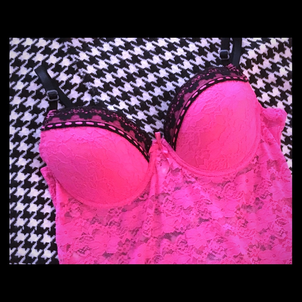 Babydoll. Striking pink with black trim, lace.
