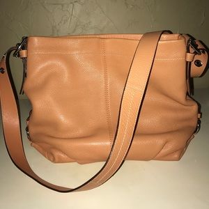 Pumpkin color COACH cross body bag