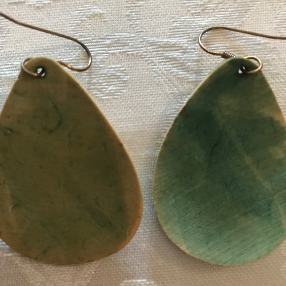 Earrings. Wood or plastic. I can not tell. Thin - Picture 2 of 2