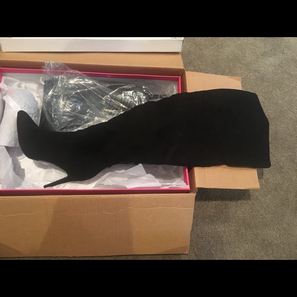 Brand new black over knee boots size 8.5