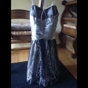 formal dress featuring a corset back.